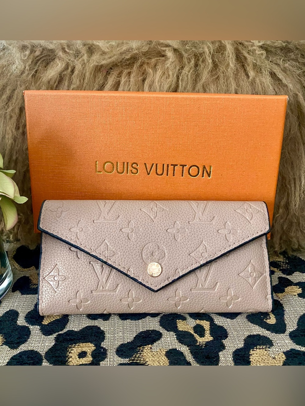 Beige unbranded tri fold wallet with box